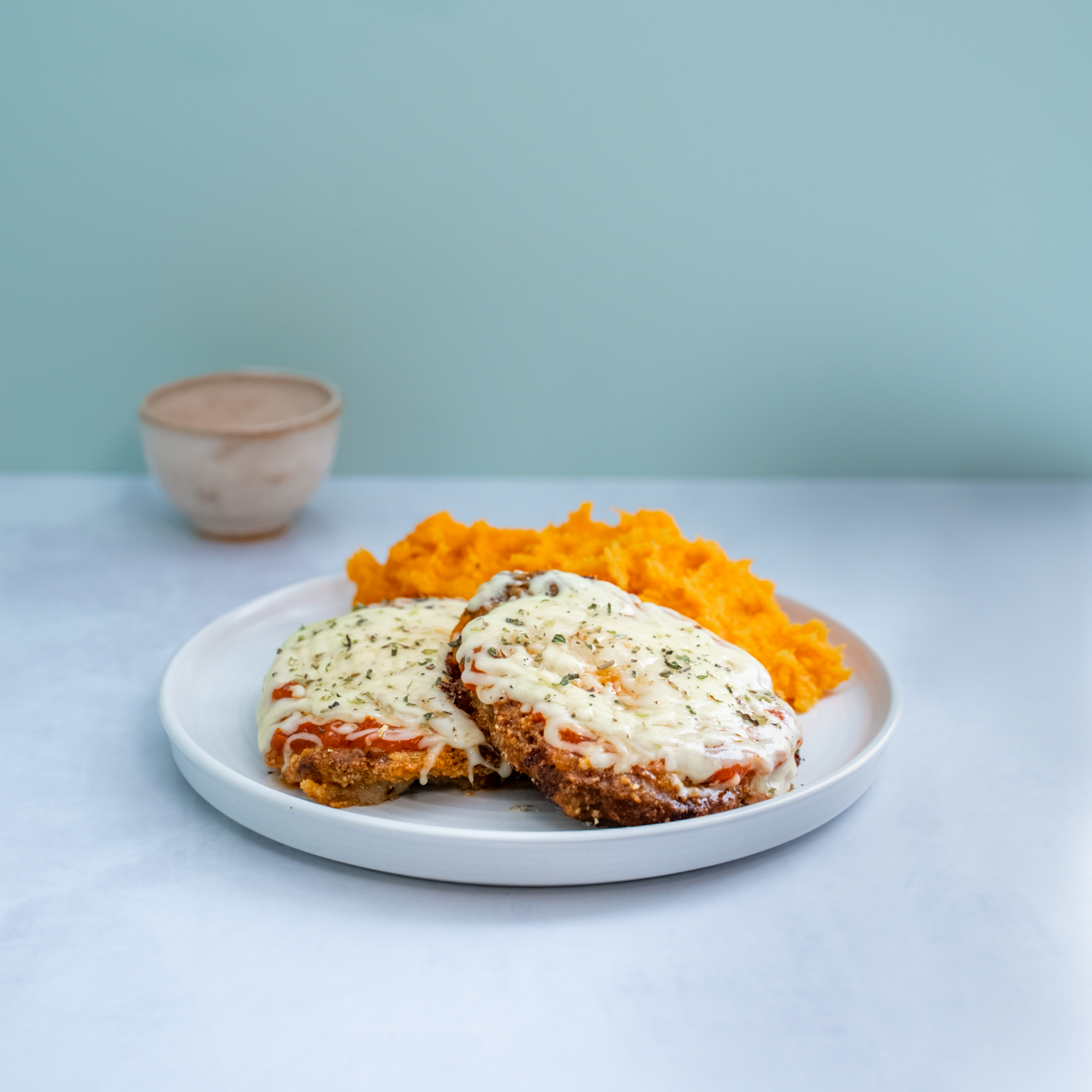 Milanesas de peceto a la napolitana con guarnición